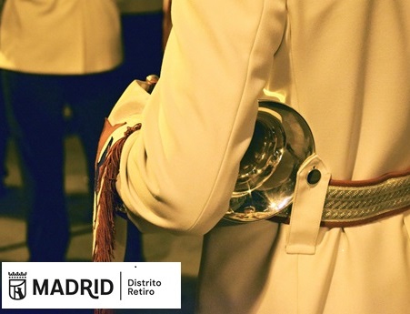 cartel con fotograf&iacute;a de m&uacute;sico de banda