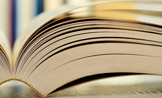 Imagen de tomo abierto utilizado de imagen gen&eacute;rica para el contenido de contratos